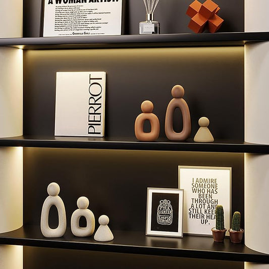 Close-up view of the white abstract sculpture, highlighting its smooth lines and texture.